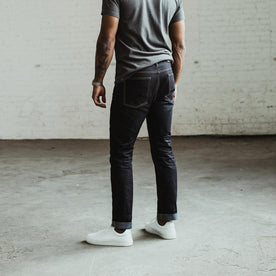 our fit model wearing The Slim Jean in Yamaashi Orimono Recover Selvage, Denim by Taylor Stitch