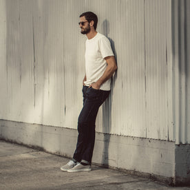 Our fit model wearing The Slim Jean in Sol Selvage Denim., Denim by Taylor Stitch