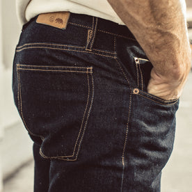 Our fit model wearing The Slim Jean in Sol Selvage Denim., Denim by Taylor Stitch