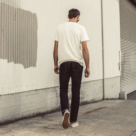 Our fit model wearing The Slim Jean in Sol Selvage Denim., Denim by Taylor Stitch