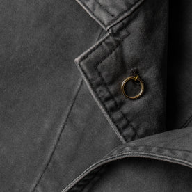 material shot of the interior button on The Ojai Jacket in Washed Charcoal, Outerwear by Taylor Stitch