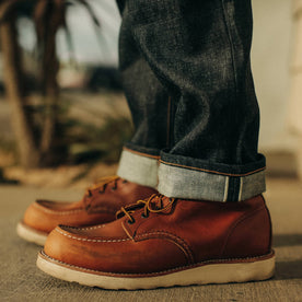 fit model wearing The Democratic Jean in Natural Indigo Selvage rolled up, Bottoms by Taylor Stitch