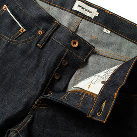 material shot of the waist on The Slim Jean in Natural Indigo Selvage, Bottoms by Taylor Stitch