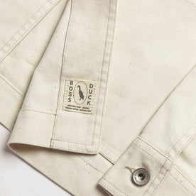 material shot of boss duck logo, Outerwear by Taylor Stitch