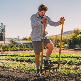 fit model farming in The Shaper Short in Stone Boss Duck., Bottoms by Taylor Stitch