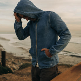 fit model wearing The Riptide Jacket in Washed Indigo Twill by the sea, Outerwear by Taylor Stitch