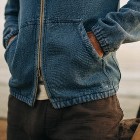 fit model with his hands in the pockets of The Riptide Jacket in Washed Indigo Twill, Outerwear by Taylor Stitch