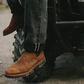 fit model wearing The Ranch Boot in Redwood Waxed Suede, looking left, Footwear by Taylor Stitch