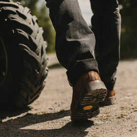 fit model wearing The Ranch Boot in Redwood Waxed Suede, walking away from camera, Footwear by Taylor Stitch