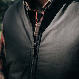 fit model showing off zipper on The Ignition Vest in Coal Dry Wax, Outerwear by Taylor Stitch