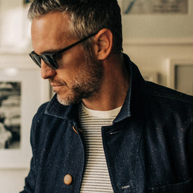 our fit model rocking The Ojai Jacket in Indigo Herringbone—cropped shot looking left, Outerwear by Taylor Stitch